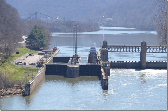 Barge tow is locked through the London lock and dam. 03-28-2015.